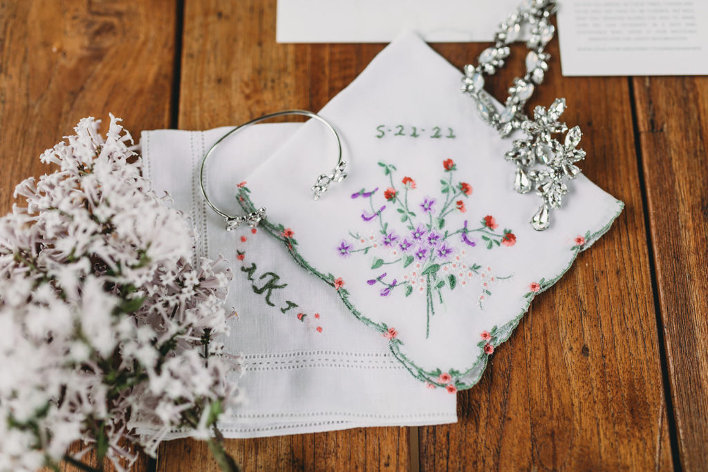 handkerchief embroidered and surrounded by floral