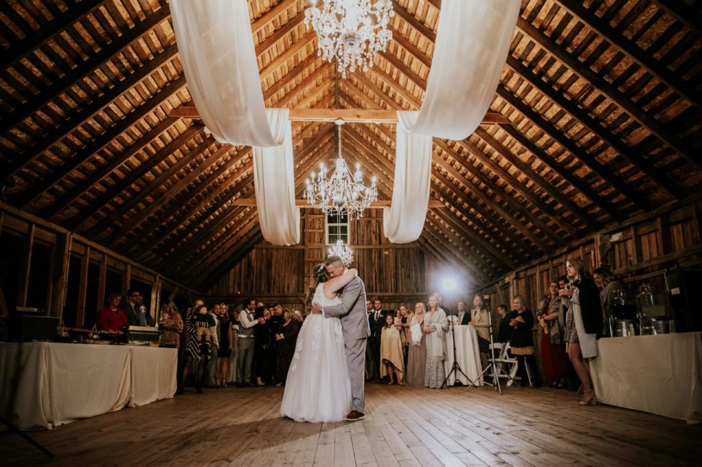 wide shot of bride and groom dancing in barn at zyntango farms on second story. this is one of the Best Indianapolis Barn Venues