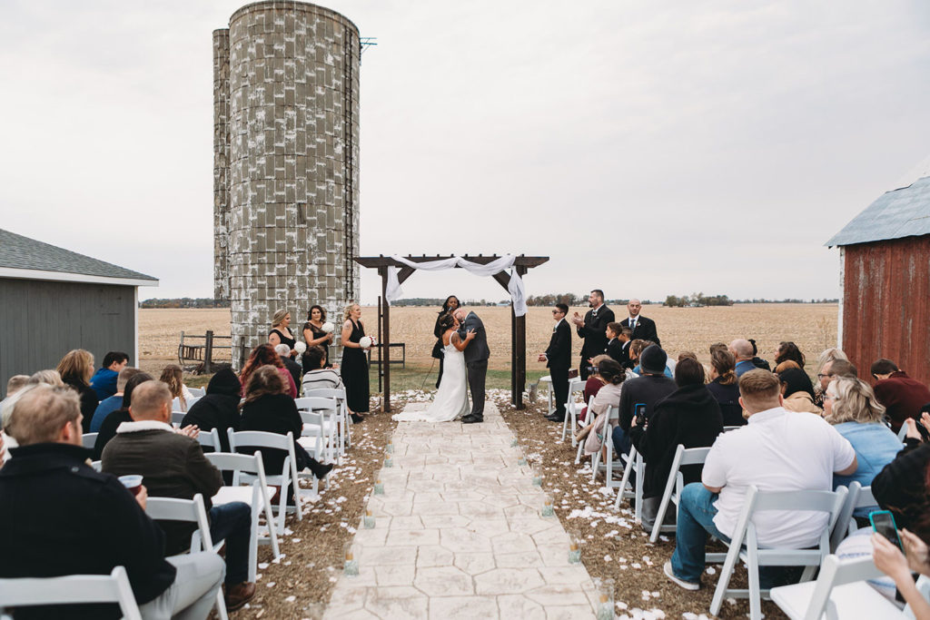first kiss at a Franklin Barn Wedding one of the Best Indianapolis Barn Venues
