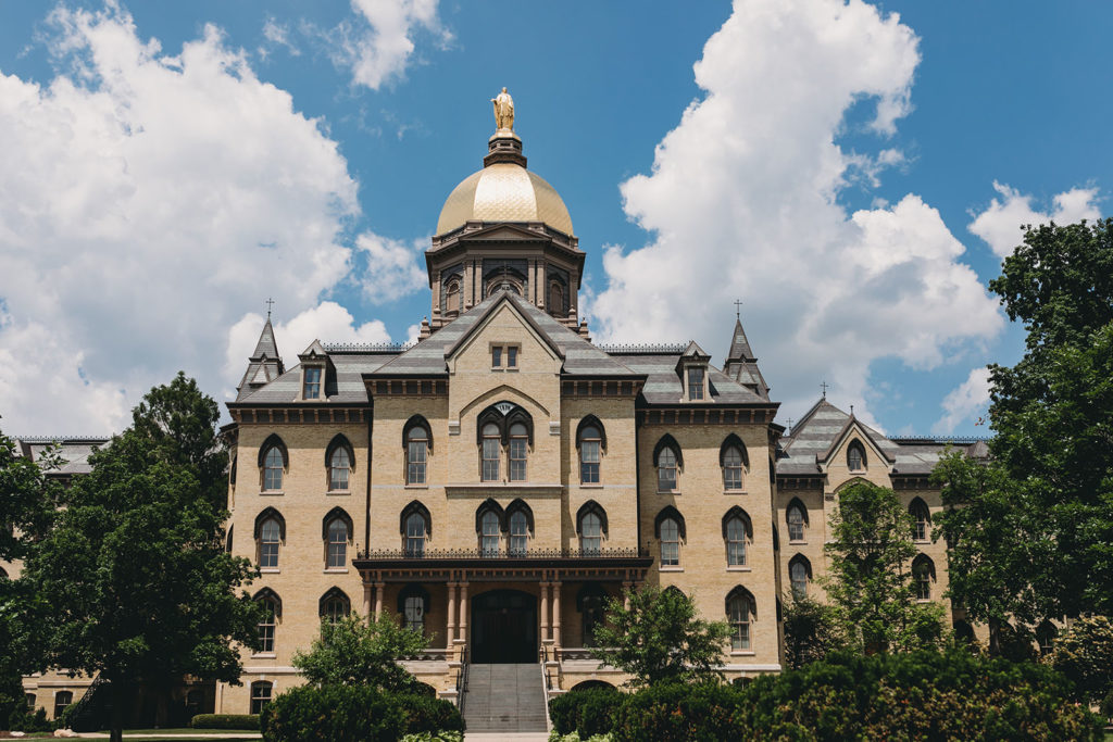 Golden Dome at University of Notre Dame with fluffy clouds