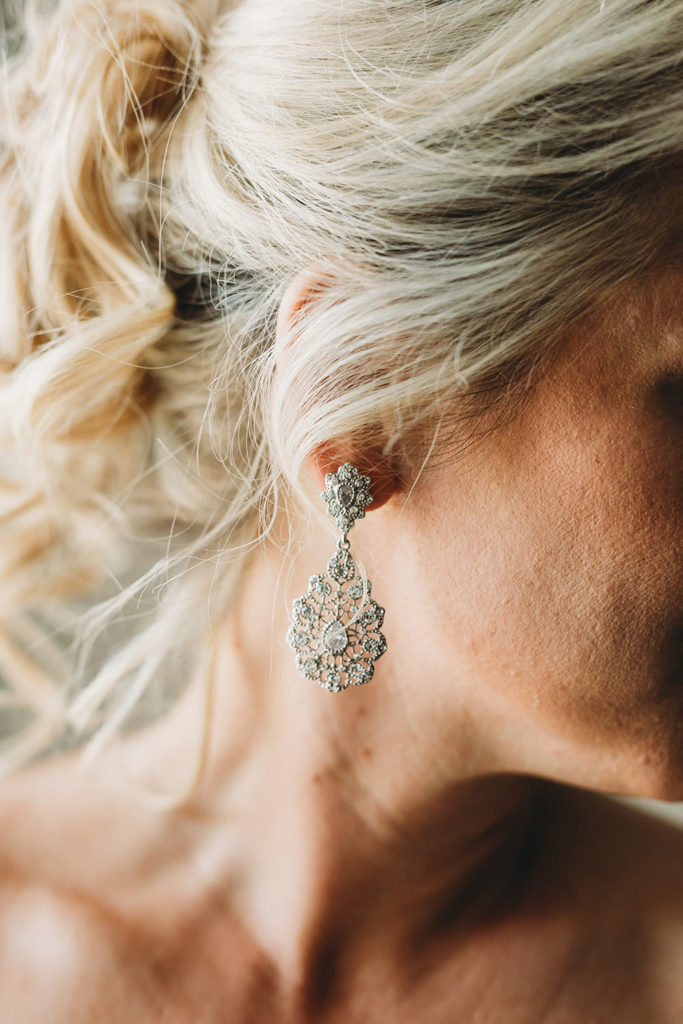 ornate earring at a sand creek wedding