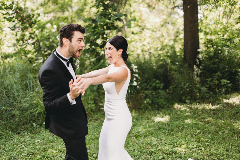 bride and groom dance and have fun before their charming coxhall gardens wedding