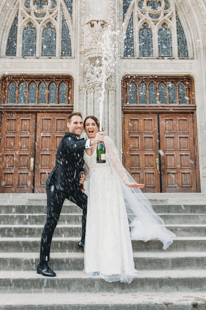 bride and groom watch champagne blast off during a scottish rite cathedral wedding