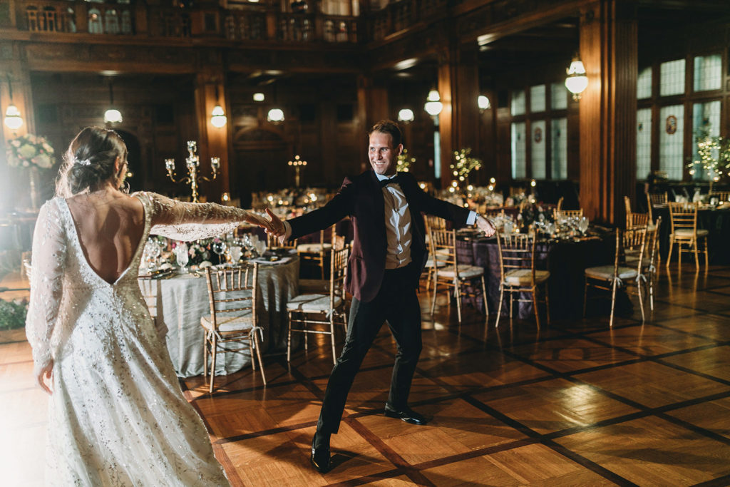 bride and groom dance lovingly and with energy during a scottish rite cathedral wedding