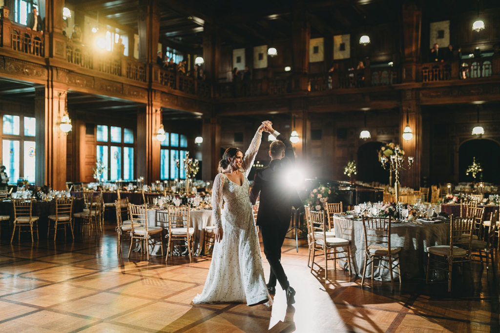 bride and groom spin during first dance during a scottish rite cathedral wedding