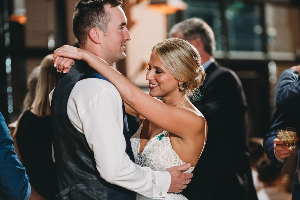 bride and groom dance surrounded by guests for a Union Station Indy Wedding