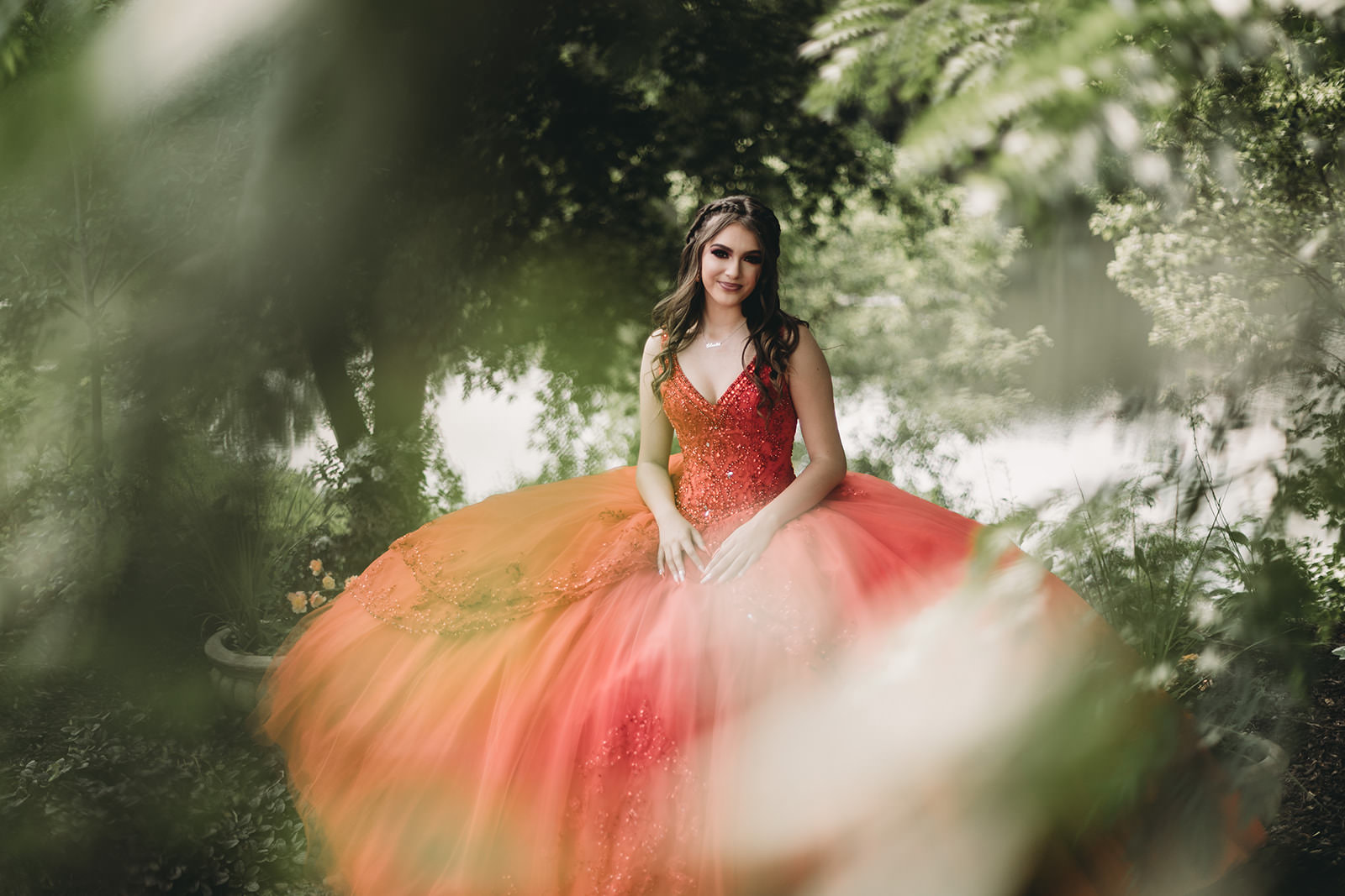 girl in red dress for her Montage Quinceañera